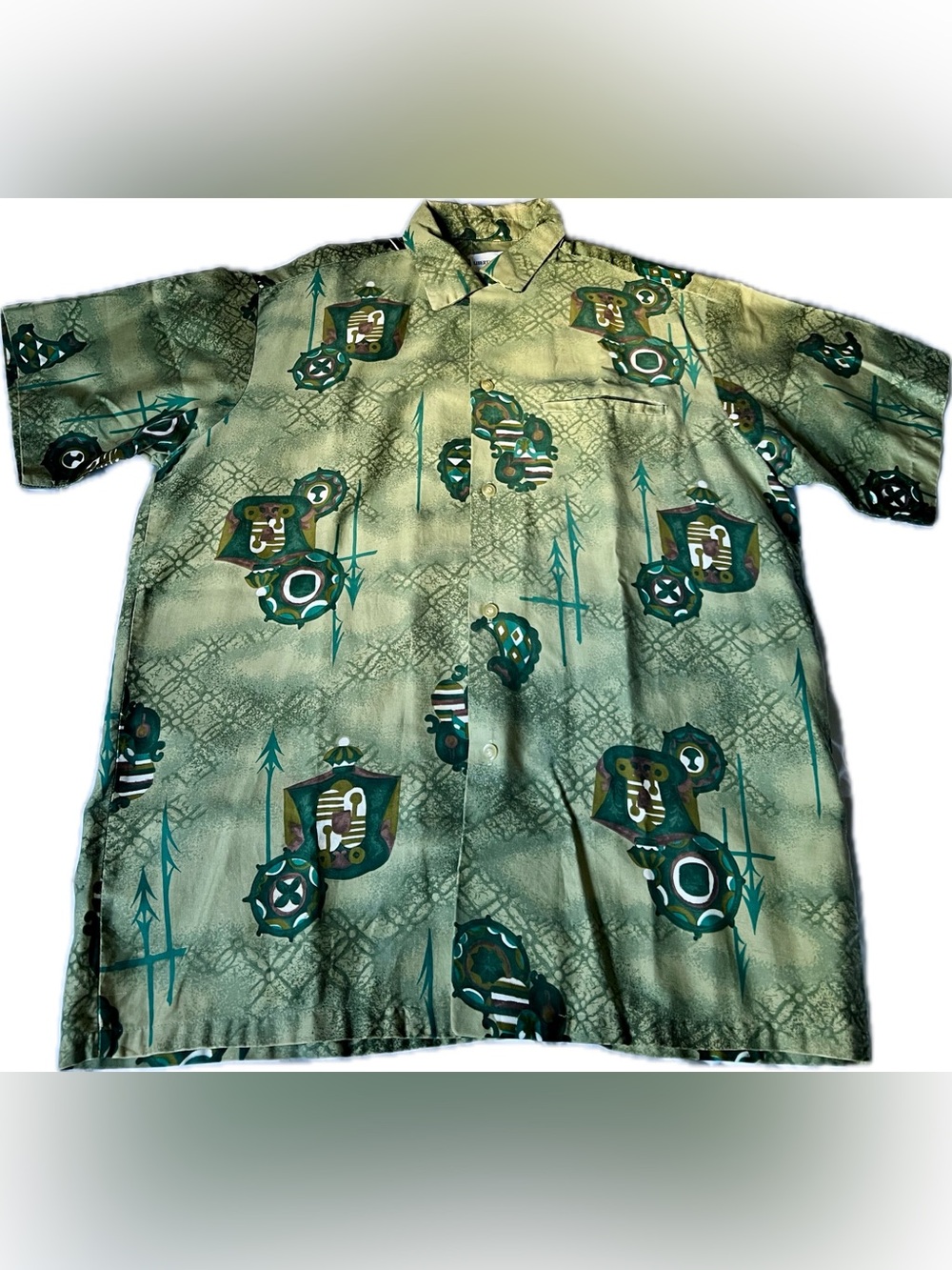 60s Liberty House Hawaii Vintage Aloha Shirt with abstract art of Hawaiian crest